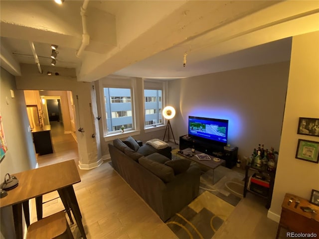 444 17th St Unit 508, Denver, CO 80202 - living room featuring light wood-style floors and track lighting