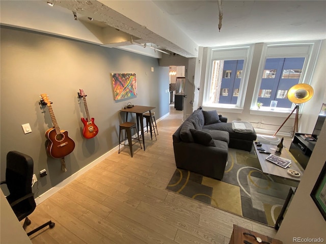 444 17th St Unit 508, Denver, CO 80202 - living room with wood finished floors and baseboards