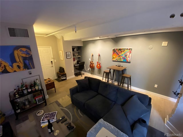 444 17th St Unit 508, Denver, CO 80202 - living area featuring wood finished floors and baseboards