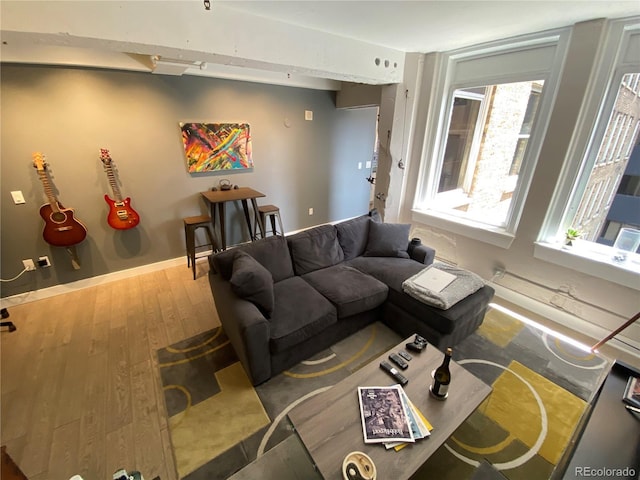 444 17th St Unit 508, Denver, CO 80202 - living area featuring wood finished floors and baseboards