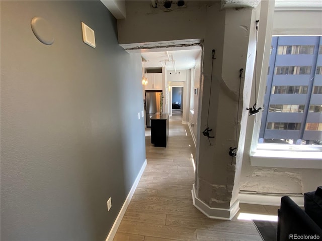 444 17th St Unit 508, Denver, CO 80202 - hall with wood finished floors and baseboards