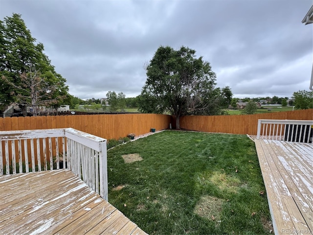 4036 S Himalaya Cir, Aurora, CO 80013 - view of yard with a wooden deck