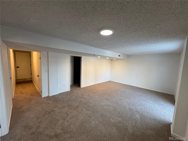 4036 S Himalaya Cir, Aurora, CO 80013 - finished basement with carpet, baseboards, and a textured ceiling