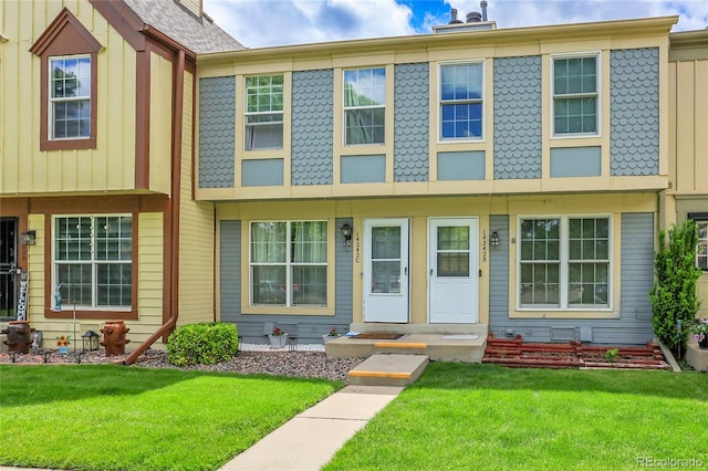 14242 E Hawaii Cir Unit C, Aurora, CO 80012 - townhome / multi-family property featuring a front lawn