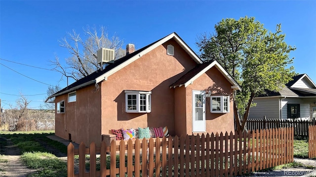 view of front of house with central AC unit