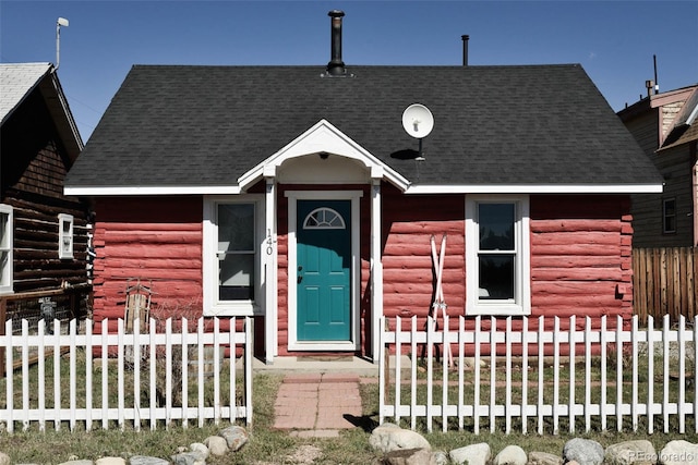 140 Eighth St, Fairplay, CO 80440 - view of front of home featuring fence, log exterior, and roof with shingles