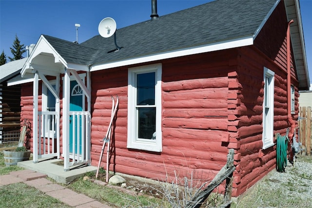 140 Eighth St, Fairplay, CO 80440 - view of side of home featuring log siding and fence