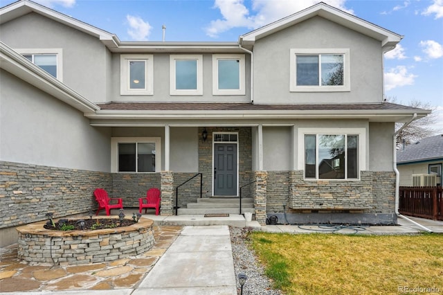 3165 W 63rd Ave, Denver, CO 80221 - view of front of home with stone siding and stucco siding
