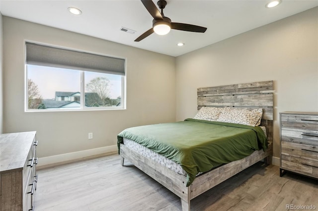 3165 W 63rd Ave, Denver, CO 80221 - bedroom with light wood-type flooring, baseboards, recessed lighting, visible vents, and ceiling fan