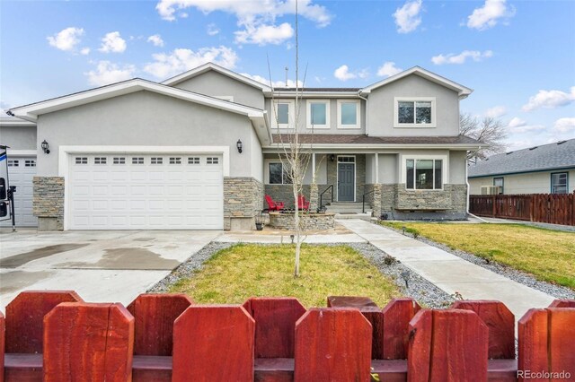 3165 W 63rd Ave, Denver, CO 80221 - view of front of house featuring fence, stone siding, and stucco siding