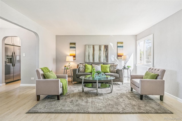 living room with light hardwood / wood-style floors