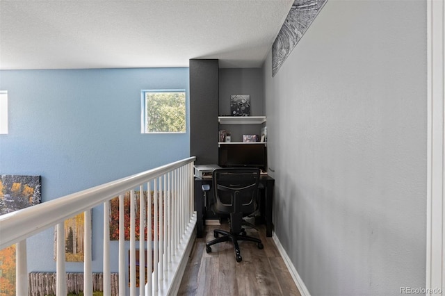 16086 E 97th Pl, Commerce City, CO 80022 - office featuring wood finished floors and a textured ceiling