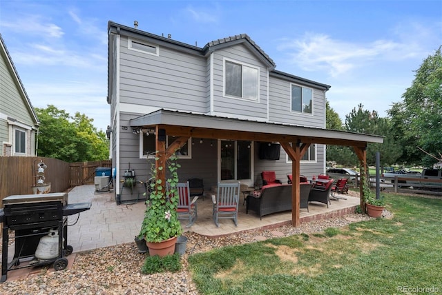 16086 E 97th Pl, Commerce City, CO 80022 - back of house with an outdoor living space, a patio, and a fenced backyard