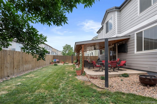 16086 E 97th Pl, Commerce City, CO 80022 - fenced backyard featuring a patio area