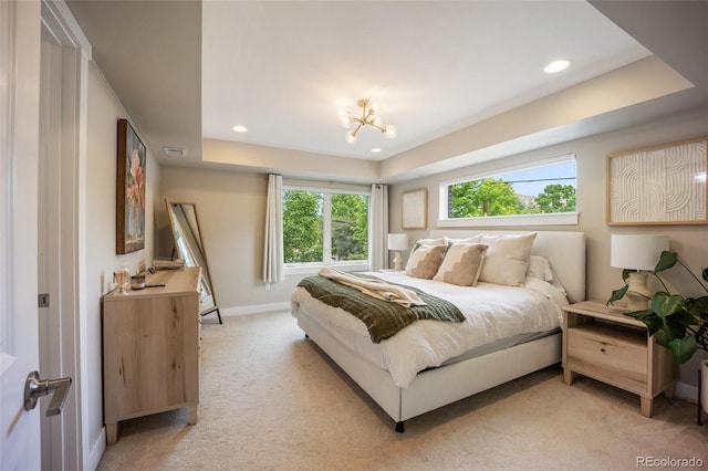 3690 W Byron Pl, Denver, CO 80211 - bedroom with light carpet, recessed lighting, a raised ceiling, and a chandelier