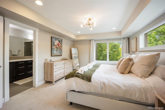 3690 W Byron Pl, Denver, CO 80211 - bedroom featuring light carpet, a chandelier, recessed lighting, ensuite bath, and a tray ceiling