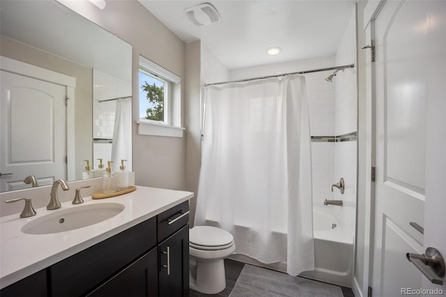 3690 W Byron Pl, Denver, CO 80211 - bathroom with vanity, shower / tub combo with curtain, and wood finished floors