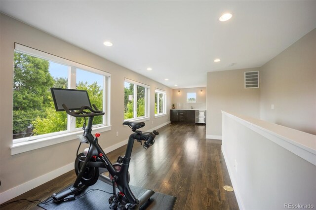 3690 W Byron Pl, Denver, CO 80211 - workout area with dark wood-style floors and recessed lighting