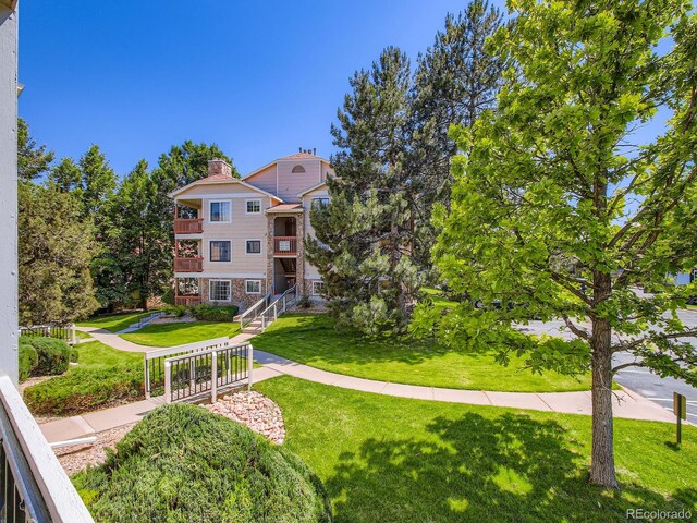 7700 N Depew St Unit 1518, Arvada, CO 80003 - surrounding community with a yard