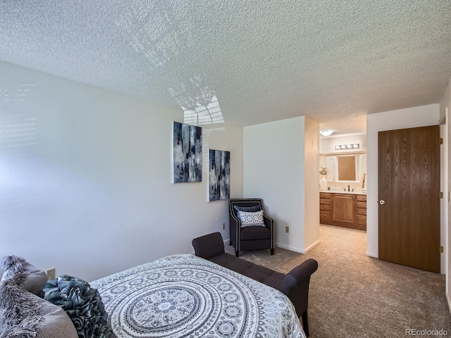 7700 N Depew St Unit 1518, Arvada, CO 80003 - bedroom featuring a textured ceiling and light colored carpet