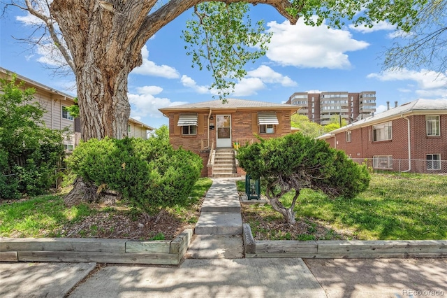 1856 S Garfield St, Denver, CO 80210 - view of front of home featuring cooling unit