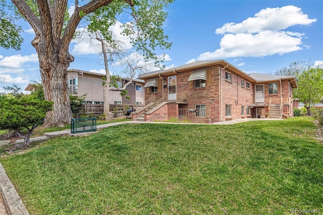 1856 S Garfield St, Denver, CO 80210 - back of house with brick siding and stairway