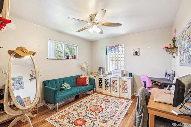 1856 S Garfield St, Denver, CO 80210 - home office with wood finished floors and ceiling fan