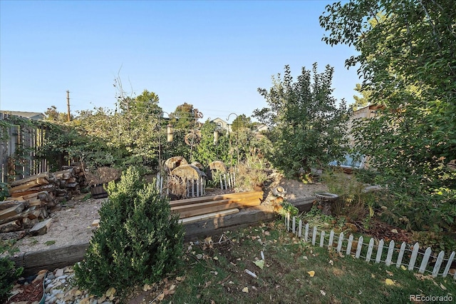 view of yard featuring fence