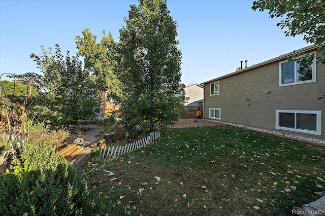 view of yard featuring fence