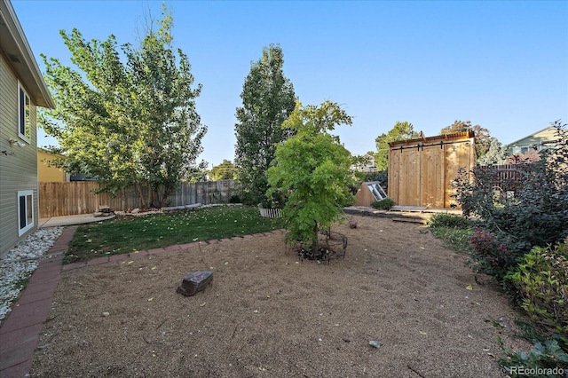 view of yard with a fenced backyard