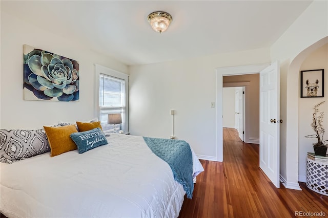 bedroom featuring dark hardwood / wood-style floors