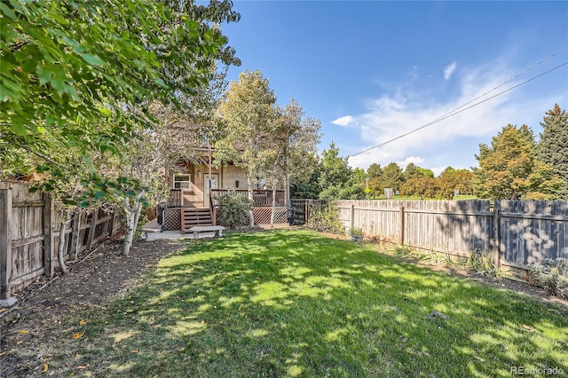 view of yard featuring a deck