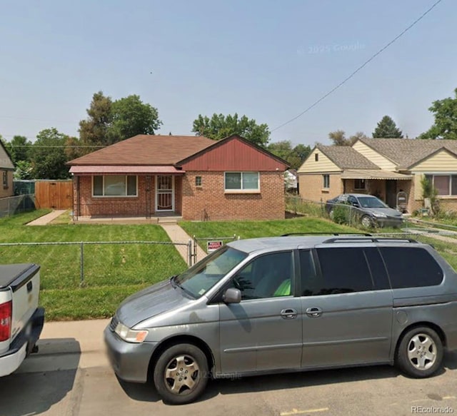 2655 Pontiac St, Denver, CO 80207 - view of front of home with brick siding