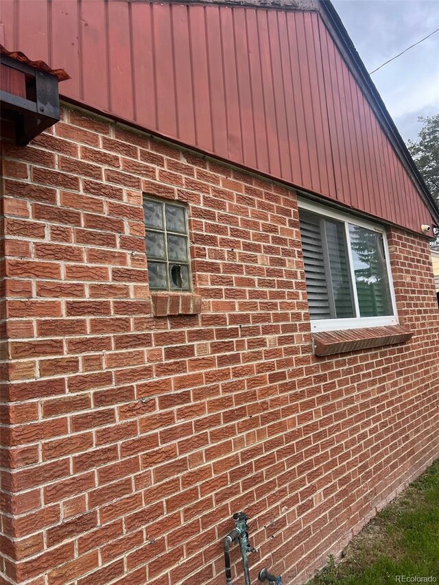 2655 Pontiac St, Denver, CO 80207 - view of home's exterior with brick siding