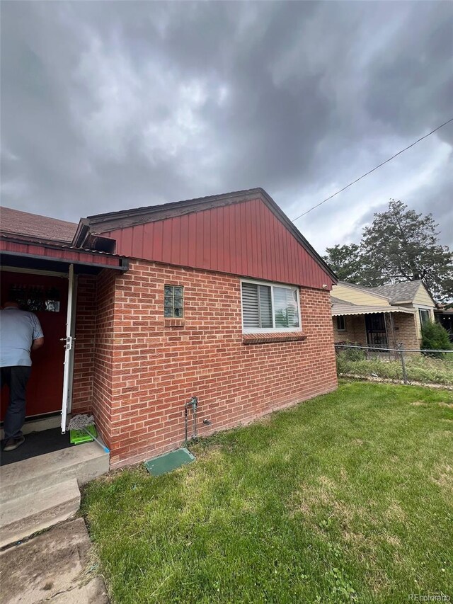 2655 Pontiac St, Denver, CO 80207 - view of home's exterior with brick siding