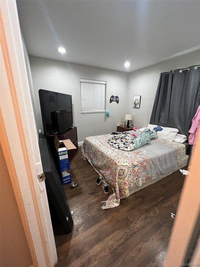 2655 Pontiac St, Denver, CO 80207 - bedroom with wood finished floors and recessed lighting
