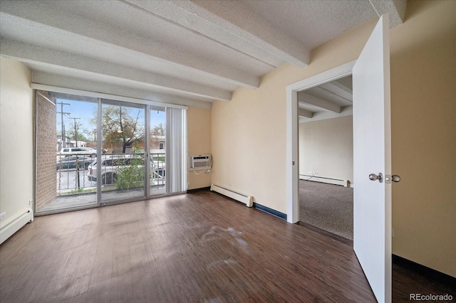 spare room with a baseboard heating unit, a baseboard radiator, beamed ceiling, dark wood-style floors, and an AC wall unit