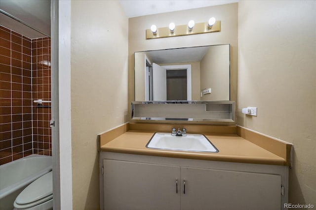 full bath with toilet, vanity, and bathtub / shower combination