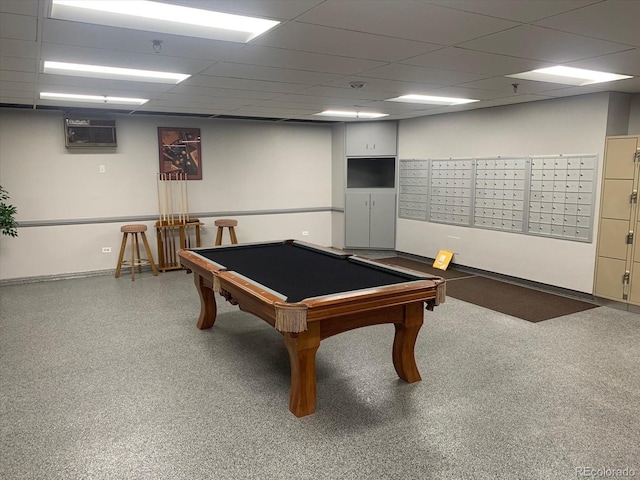 rec room with a wall mounted AC, a paneled ceiling, baseboards, mail area, and pool table