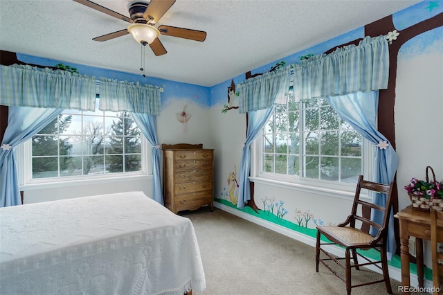 31 N Algonquian St, Aurora, CO 80018 - carpeted bedroom featuring a textured ceiling and a ceiling fan