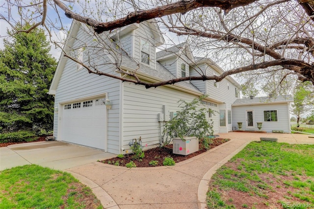 31 N Algonquian St, Aurora, CO 80018 - view of property exterior featuring driveway