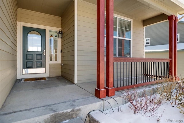 entrance to property with a porch