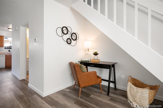 office space featuring dark wood-style floors and baseboards