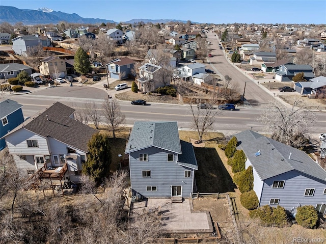 bird's eye view featuring a residential view and a mountain view