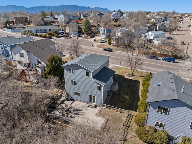 aerial view with a residential view and a mountain view