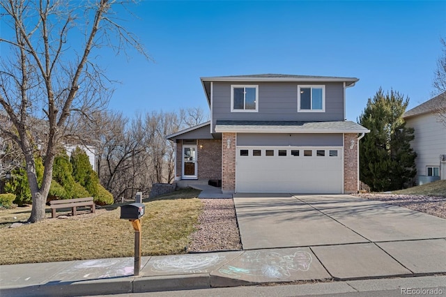 view of front of property featuring an attached garage, brick siding, and driveway