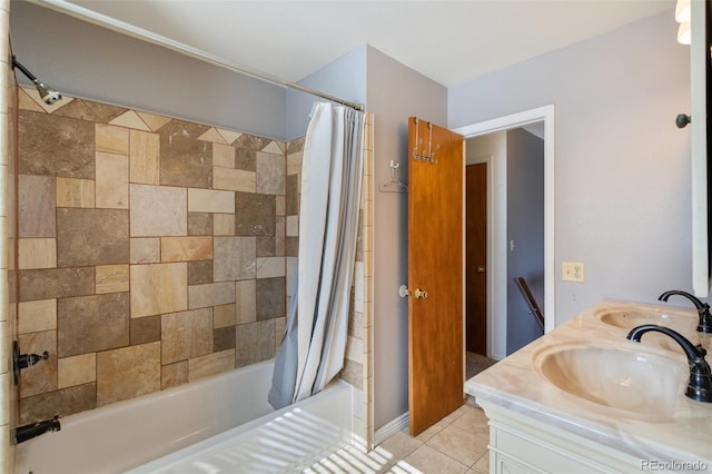 bathroom with tile patterned flooring, double vanity, shower / tub combo, and a sink