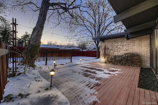 view of snow covered deck