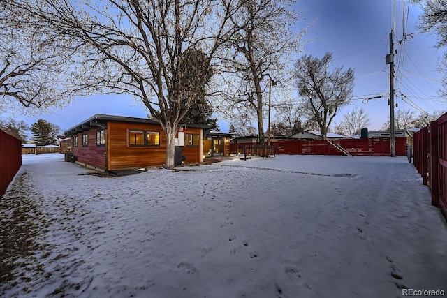 view of yard layered in snow