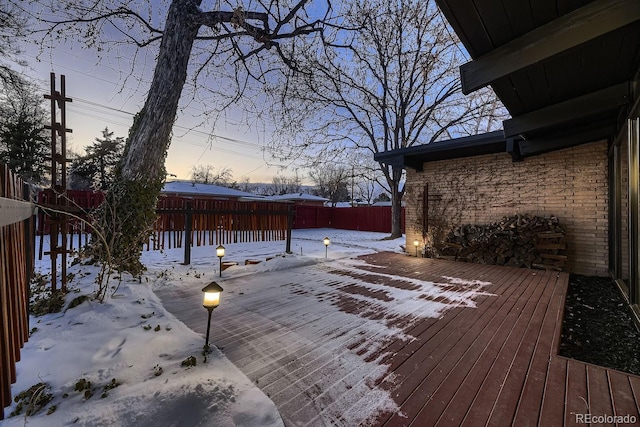 view of snow covered deck